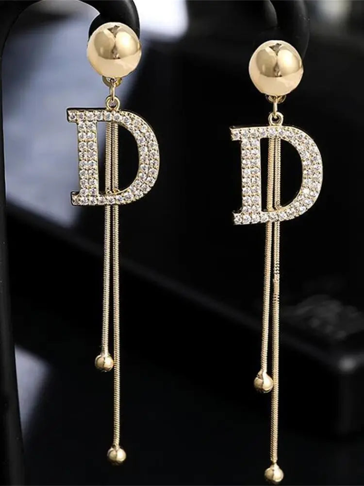 Gold Crystal Letter D Tassel Earrings