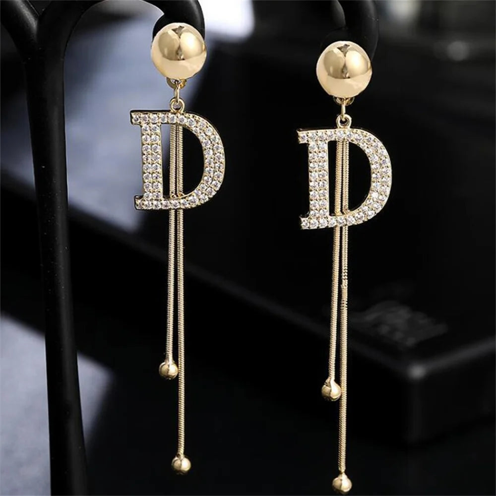 Gold Crystal Letter D Tassel Earrings