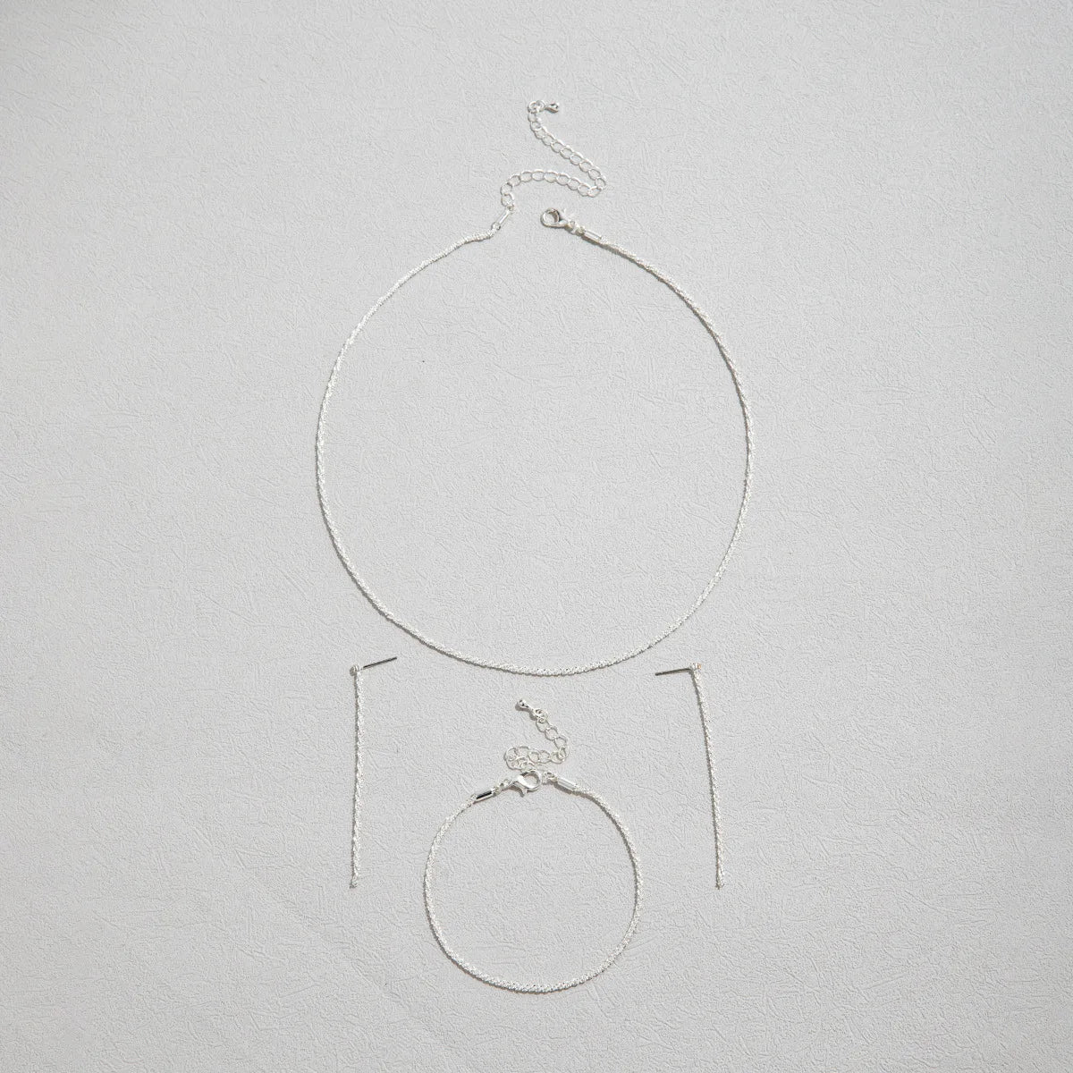 Silver Necklace & Bracelet Set with Star Design