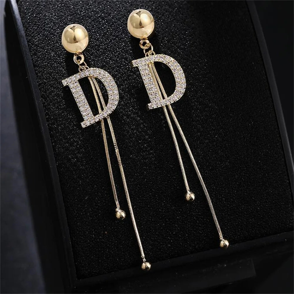 Gold Crystal Letter D Tassel Earrings