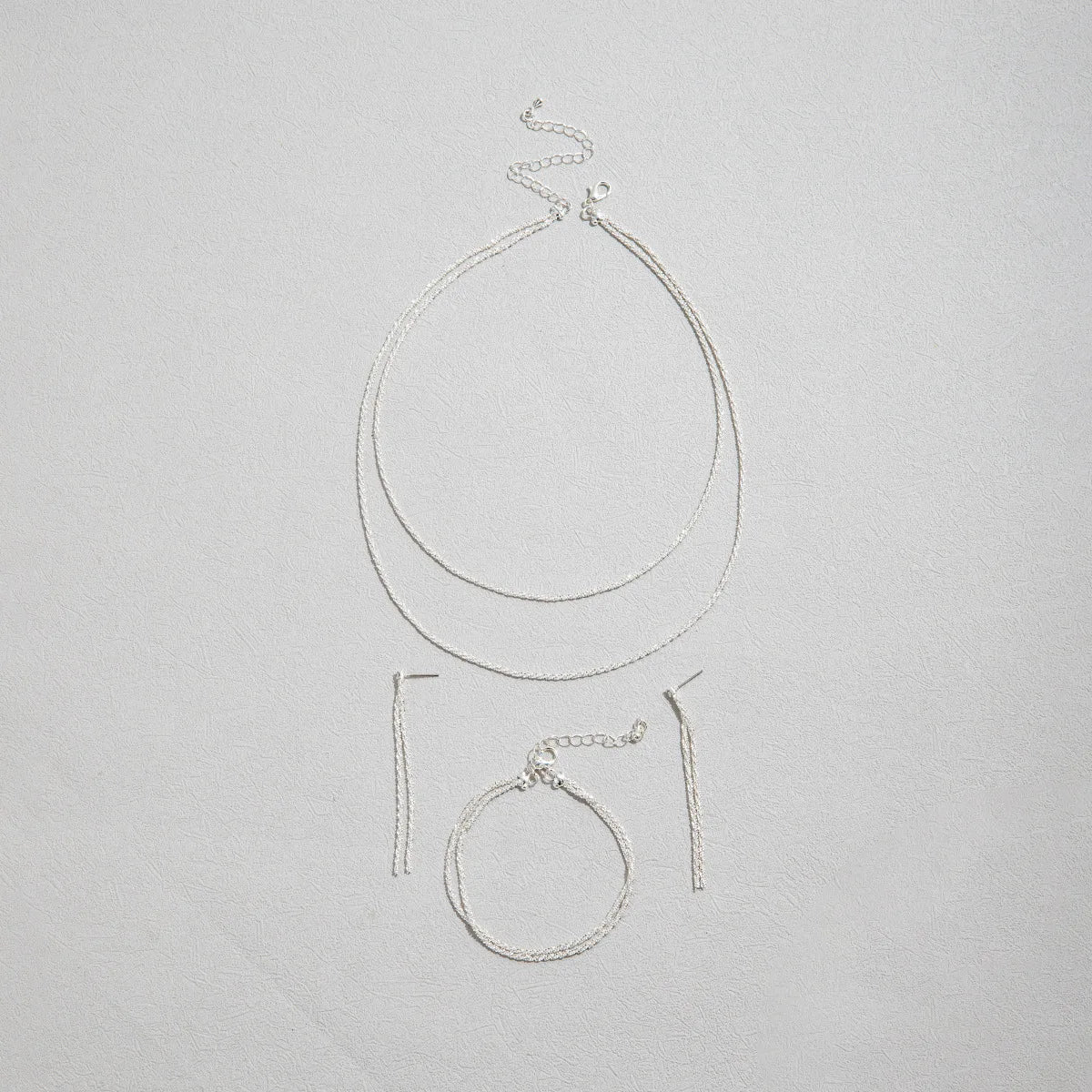 Silver Necklace & Bracelet Set with Star Design